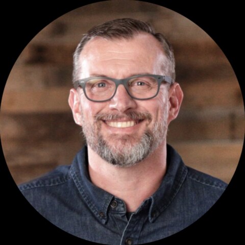 Headshot of Justin Ahrens, founder of Rule29